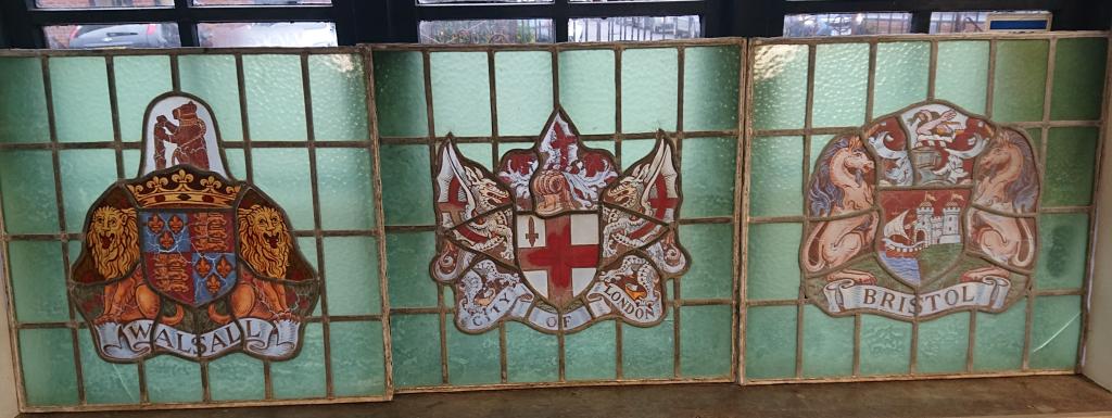 <p>Selection of Hand Painted Murials with City names mounted on leaded glass, reclaimed from a Pub in London.</p>